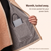 Open-top grey inner pocket carries an upright external power bank; USB-A cable powers the cape